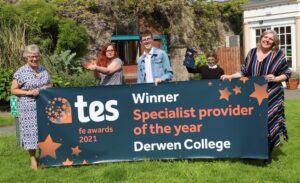 Derwen College's Chair of Governors K Kimber and Principal & CEO Meryl Green celebrate the college's Specialist Provider of the year status with students Courtney and Joe.