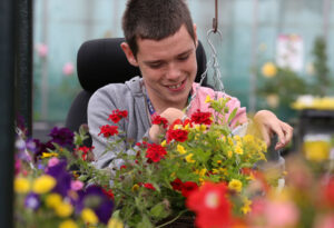 Student learning plant and gardening skills