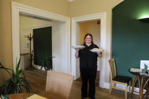 Hospitality student Jodie serves up lunches at the Orangery Restaurant