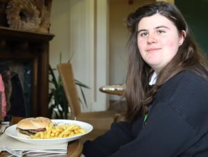 Student Libby is looking forward to eating her beef burger and chips
