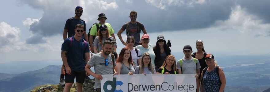 College staff fundraise for Derwen by climbing Snowdon