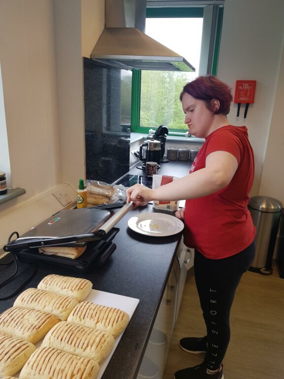Telford hospitality student making paninis