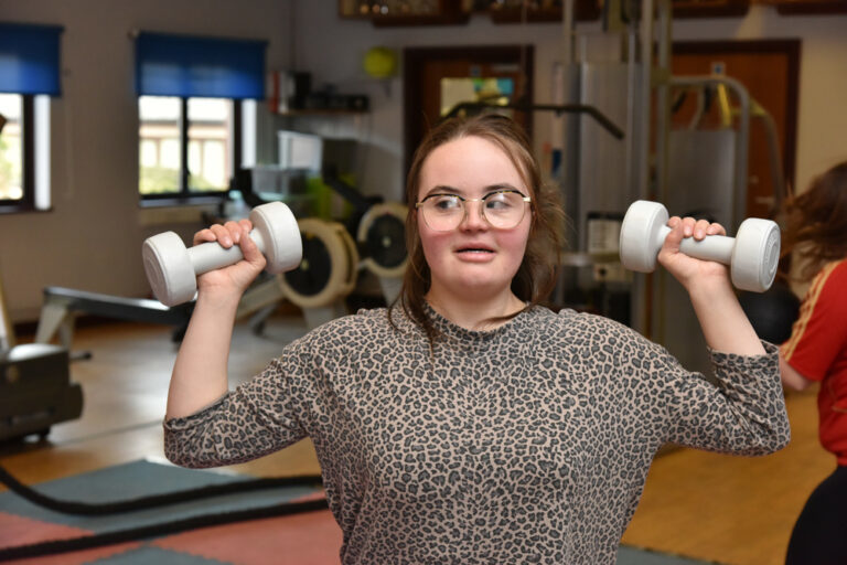 student working out in the gym