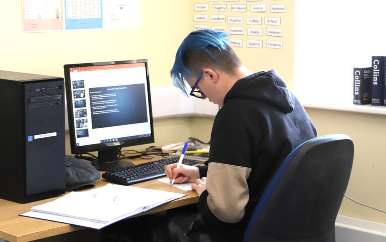 student working at computer