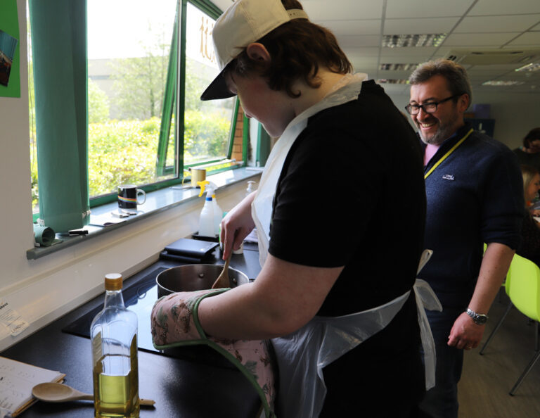 Student learning to cook