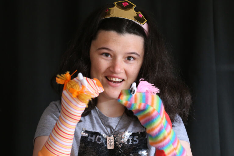 Performing Arts student with sock puppets
