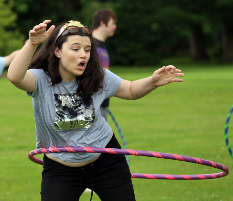 Student using hula hoop