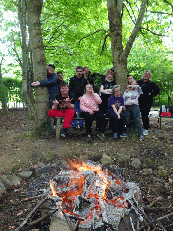 Silver group 20222 sit around the camp fire