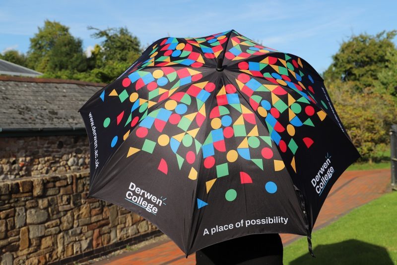 Image of Derwen umbrella wshowing the Derwen College branding
