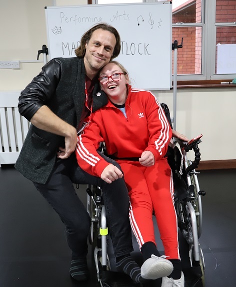 Martin with student Shonna who is in a wheelchair.