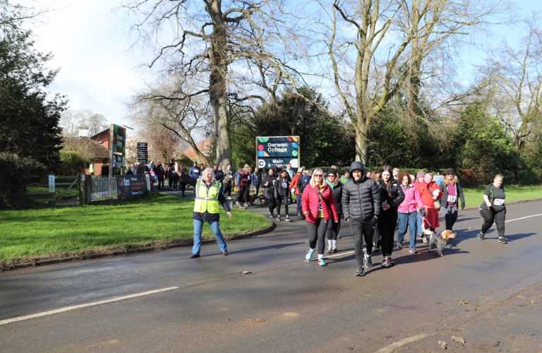 Walkers crossing the road for the 10K Challenge