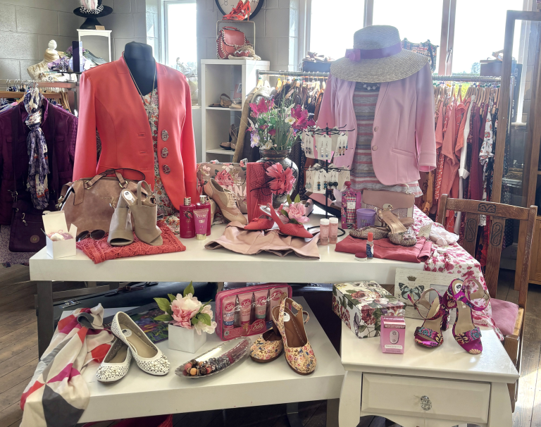 Selection of ladies' pink clothing and accessories on display