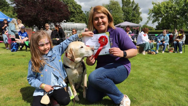 a girl with a dog and a lady at derwen fete