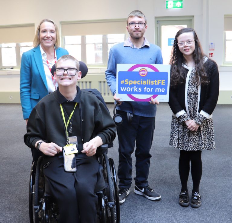 Group photograph showing students and MP supporting the #SpecialistFE campaign, with a sign reading "#SpecialistFE works for me".
