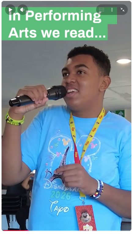 Student singing into a microphone. Caption says, In Performing Arts we read...