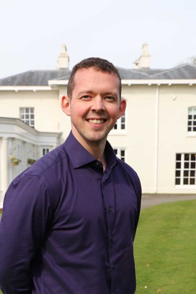 Dan Owen standing in front of the Orangery restaurant